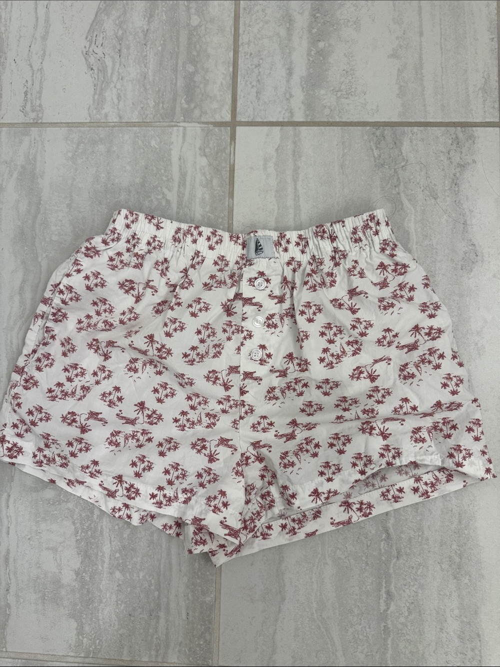 High-Waist White Shorts with Red Floral Print
